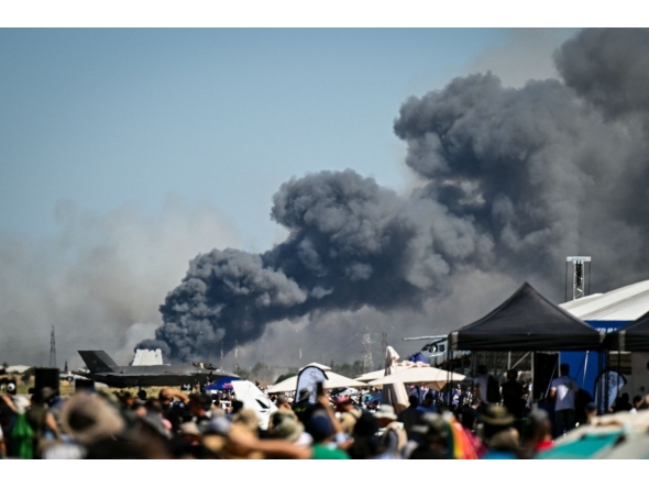 Smoke rises after a Phantom F-4 military jet crashed during the Athens Flying Week air show at the military airport of Tanagra, near Athens on September 5, 2026. (Photo by Theophile BLOUDANIS / AFP)
