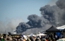 Smoke rises after a Phantom F-4 military jet crashed during the Athens Flying Week air show at the military airport of Tanagra, near Athens on September 5, 2026. (Photo by Theophile BLOUDANIS / AFP)
