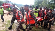 Rescuers transfer a worker rescued alive in Rasuwa district, Nepal, Sept. 4, 2026. (RSS via Xinhua)