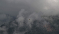 A helicopter takes off from a temporary relief camp in the aftermath of flash floods at Trishuli Bazar, Nepal's Nuwakot district, on September 6, 2026. (Photo by Prakash MATHEMA / AFP)
 
