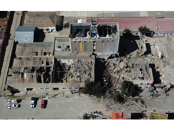 This aerial view show the army barracks after an explosion on the eve, in Viacha, Bolivia, on September 5, 2026. At least two people were killed, 81 injured, and 14 people are still missing after a powerful explosion on September 4, 2026 at a military facility storing pyrotechnic material in Bolivia. The cause of the blast remains under investigation. (Photo by Aizar RALDES / AFP)