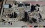 This aerial view show the army barracks after an explosion on the eve, in Viacha, Bolivia, on September 5, 2026. At least two people were killed, 81 injured, and 14 people are still missing after a powerful explosion on September 4, 2026 at a military facility storing pyrotechnic material in Bolivia. The cause of the blast remains under investigation. (Photo by Aizar RALDES / AFP)