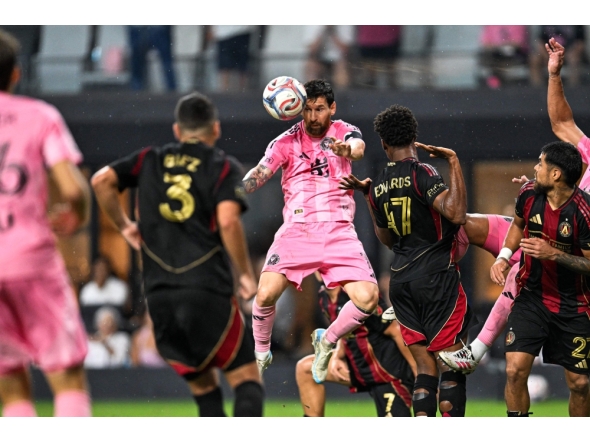 Inter Miami's Argentine forward #10 Lionel Messi goes up for a header during a Major League Soccer (MLS) regular season football match between Inter Miami CF and Atlanta United FC at Nu Stadium in Miami, Florida, on September 5, 2026. (Photo by CHANDAN KHANNA / AFP)