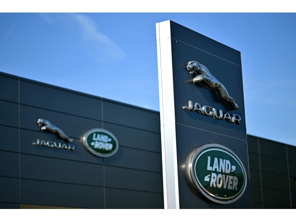 Jaguar Land Rover signage is seen on a dealership in Tonbridge, south-east of London on September 29, 2025. Photo by Ben STANSALL / AFP