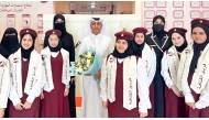 MoEHE Undersecretary Dr. Ibrahim bin Saleh Al Nuaimi with officials and students during his visit to a school yesterday.