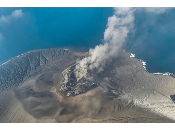 This handout aerial picture taken on September 6, 2026 and released on September 7, 2026 by the Indonesia's Center for Volcanology and Geological Hazard Mitigation shows the Mount Krakatau (Krakatoa) in the Sunda Strait, in South Lampung, Lampung province, spewing smoke and volcanic ash during an eruption. (Photo by Handout / Indonesia's Center for Volcanology and Geological Hazard Mitigation / AFP)