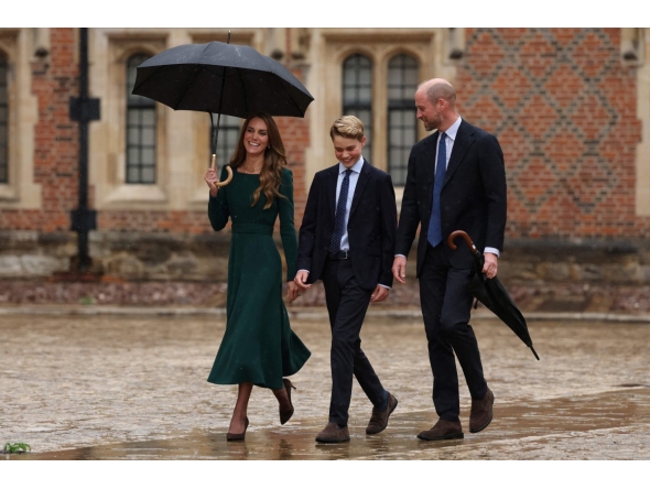 Britain's Catherine, Princess of Wales (L) and Britain's Prince William, Prince of Wales (R) walk with their 13-year-old son, Britain's Prince George of Wales (C), as he arrives for his first day at Eton College, in Eton, west of London, on September 8, 2026. (Photo by Adrian DENNIS / POOL / AFP)