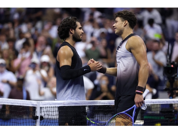 Carlos Alcaraz of Spain shakes hands after a loss against Ben Shelton of the United States during their Men's Singles Quarterfinal match on Day Ten of the 2026 US Open at USTA Billie Jean King National Tennis Center on September 08, 2026 in the Flushing neighborhood of the Queens borough of New York City. (Matthew Stockman/Getty Images/AFP)
