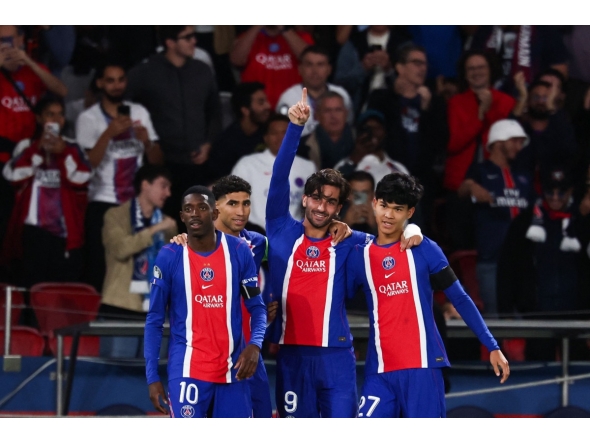 Paris Saint-Germain's Spanish forward #09 Ferran Torres (C) celebrates with Paris Saint-Germain's French forward #10 Ousmane Dembele (L), Paris Saint-Germain's Moroccan defender #02 Achraf Hakimi (2nd L) and Paris Saint-Germain's Spanish midfielder #27 Dro Fernandez (R) after scoring his team fourth goal during the UEFA Champions League, league phase, matchday 1, football match between Paris Saint-Germain (PSG) and Slovan Bratislava at the Parc des Princes Stadium in Paris on September 9, 2026. (Photo by FRANCK FIFE / AFP)