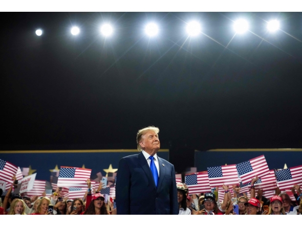 US President Donald Trump walks on stage to speak on the first day of the 2026 Republican National Convention at the American Airlines Center on September 09, 2026 in Dallas, Texas. Andrew Harnik/Getty Images/AFP