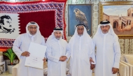 Director of the Agricultural Affairs Department Yousef Khalid Al Khalifi (second left) with agricultural engineers during the event.