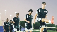 Qatar U-23 players take part in a training session as they gear up for the Asian Games in Japan.