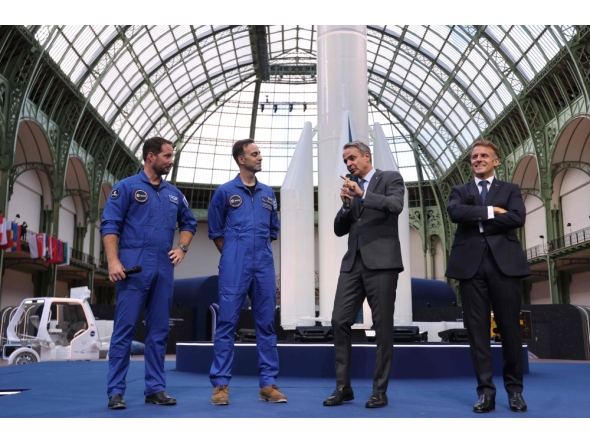 (From L) French European Space Agency (ESA) astronaut Thomas Pesquet, Greek aviation medical examiner and European Space Agency (ESA) astronaut candidate Adrianos Golemis, Greece's Prime Minister Kyriakos and France's President Emmanuel Macron speak during the International Space Summit at the Grand Palais in Paris on September 9, 2026. (Photo by Ludovic MARIN / POOL / AFP)