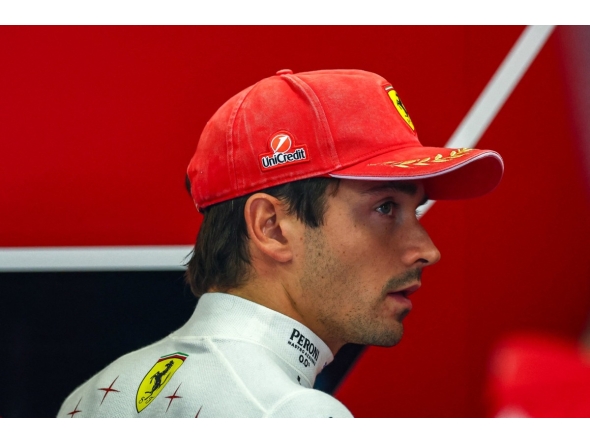 Ferrari's Monegasque driver Charles Leclerc looks on in the pits ahead of the qualifying session of the Italian Formula One Grand Prix at the Autodromo Nazionale Monza circuit in Monza, northern Italy on September 5, 2026. (Photo by ANNA SZILAGYI / POOL / AFP)
