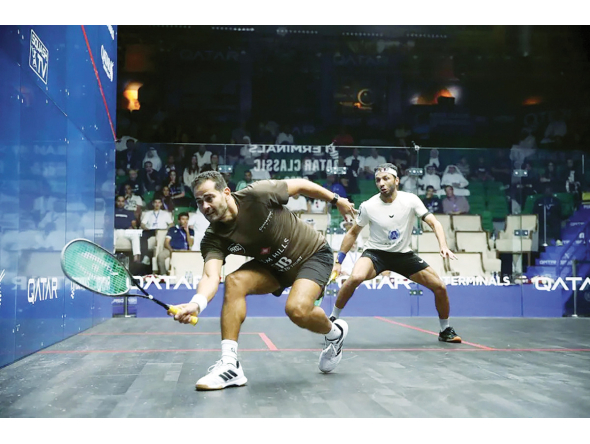 Egypt's Karim Abdel Gawad (left) in action against Qatar's Abdulla Al Tamimi.