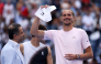 Alexander Zverev of Germany celebrates with the winner's check after defeating Ben Shelton of the United States in their Men's Singles Final match on Day Fifteen of the 2026 US Open at USTA Billie Jean King National Tennis Center on September 13, 2026 in the Flushing neighborhood of the Queens borough of New York City. (Photo by  Matthew Stockman/Getty Images/AFP) 