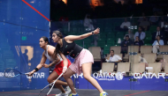 Rachel Arnold (left) and Nour ElSherbini in action during their match yesterday.  