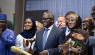 Aliko Dangote President and Chief Executive Officer of the Dangote Group hits the gong during the Dangote Refinery’s inital public offering at the Nigerian Exchange Group in Lagos NIgeria yesterday.