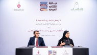 Executive Director of the Arab Book Award Dr. Naji Al-Sharif and Chair of the Arab Publishers Union's Arab Relations Committee Dr. Aisha Jassim Al-Kuwari during the signing of the agreement.