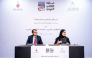Executive Director of the Arab Book Award Dr. Naji Al-Sharif and Chair of the Arab Publishers Union's Arab Relations Committee Dr. Aisha Jassim Al-Kuwari during the signing of the agreement.