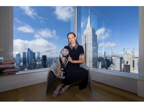 Elena Rybakina of Kazakhstan poses with the Chris Evert WTA World No. 1 Trophy.