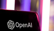 The OpenAI logo is seen at the 