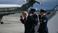 US President Donald Trump steps off Air Force One upon arrival to John F. Kennedy International Airport in New York on September 21, 2026. (Photo by Brendan Smialowski / AFP)