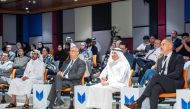 UDST President Dr. Salem Al-Naemi (second right) and other officials at the event.