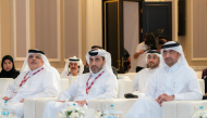 Minister of Justice and Minister of State for Cabinet Affairs H E Ibrahim bin Ali bin Issa Al Hassan Al-Mohannadi with other officials during the event.
