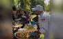 Community members enjoy Qatari dishes at the event. 