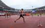 Japan's Ichitaka Yamashita enters the stadium during the 2026 Asian Games at Nagoya City Mizuho Park Athletic Stadium in Nagoya, Aichi Prefecture on September 26, 2026. (Photo by David Gray / AFP)