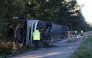 Emergency services and firefighters work at the site of a bus accident near Buchloe-Ost, southern Germany, early on September 27, 2026, where the coach had overturned on the A96 motorway. Photo by Karl-Josef Hildenbrand / dpa / AFP