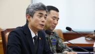 Defence Minister of the Republic of Korea Kang Shin-chul (L) speaks during a parliamentary defence committee hearing on the landmine explosion accident in the DMZ, at the National Assembly in Seoul on September 29, 2026. Photo by - / YONHAP / AFP