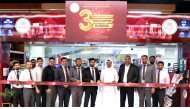 Officials and representatives of Rawabi Hypermarket Izghawa during the ribbon cutting ceremony.