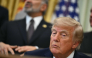 US President Donald Trump listens to US Commerce Secretary Howard Lutnick in the Oval Office of the White House in Washington, DC, on September 30, 2026. (Photo by Kent NISHIMURA / AFP)