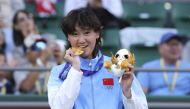 Gold medalist Wang Xiyu of China poses during the awarding ceremony for the women's singles of tennis at the 20th Asian Games Aichi-Nagoya 2026 in Nagoya, Japan, Oct. 2, 2026. (Xinhua/Li Bo)