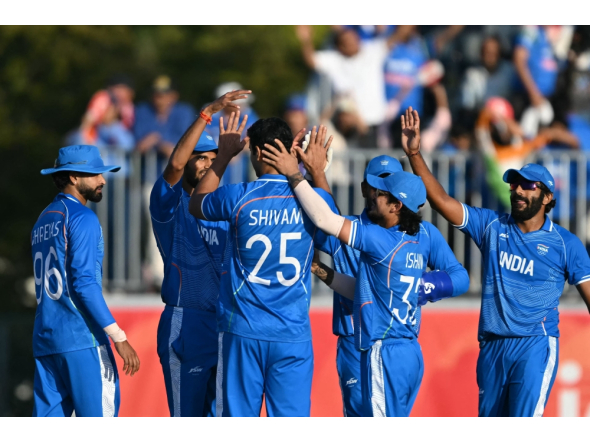 India players celebrate the dismissal of Pakistan's Saim Ayub during the men's cricket final match between Pakistan and India during the 2026 Asian Games at the Korogi Athletic Park in Nisshin on October 3, 2026. (Photo by Andrew Caballero-Reynolds/ AFP)