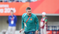 Antonio Puche, head coach of China, reacts during the men's football semifinal between China and South Korea at 20th Asian Games Aichi-Nagoya 2026 in Osaka, Japan, Sept. 30, 2026. (Xinhua/Lui Siu Wai)