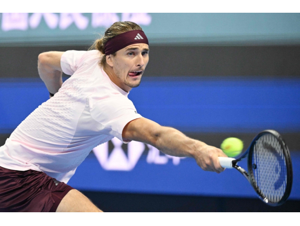 Germany Alexander Zverev hits a return to China Shang Juncheng during their men singles match at the China Open tennis tournament in Beijing on October 3, 2026. (Photo by GREG BAKER / AFP)