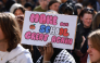 A high school student holds a placard during a gathering amid a nationwide protest movement over school conditions in Saint-Denis, north of Paris, on October 4, 2026. Photo by Kenzo TRIBOUILLARD / AFP