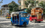 Tuk-tuk drivers transport residents' belongings amid fears of looting as residents and fighters leave the city in Mekelle on October 3, 2026. (Photo by AFP)