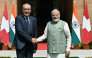 India's Prime Minister Narendra Modi (R) and Switzerland's President Guy Parmelin shake hands before their meeting at the Hyderabad House in New Delhi on October 5, 2026. (Photo by Sajjad HUSSAIN / AFP)