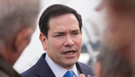 :US Secretary of State Marco Rubio speaks to the press before boarding a plane en route to Iceland at Joint Base Andrews, Maryland, on October 5, 2026. Photo by Mark Schiefelbein / POOL / AFP