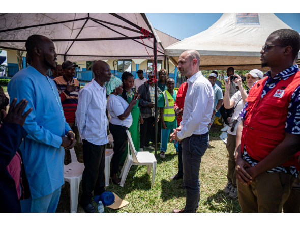 French Minister for Europe and Foreign Affairs Jean-Noël Barrot speaks with family members of Ebola patients during his visit to the Rwampara Ebola Treatment Centre in Bunia, Ituri Province, Democratic Republic of Congo, on October 3, 2026. (Photo by Hardy BOPE / AFP)