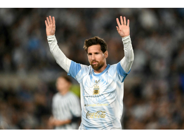 Argentina's forward #10 Lionel Messi waves to fans in Buenos Aires on October 6, 2026. (Photo by Luis Robayo / AFP)