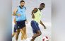 Al Duhail's Almoez Ali (right) and Sultan Al-Brake during a training session yesterday.