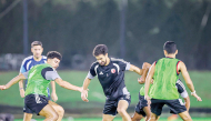 Al Shamal players in action during a training session.