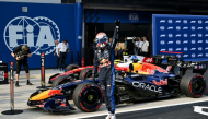 Max Verstappen salutes the crowd after qualifying in pole position for the Bahrain GP. 