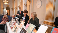 Copies of books by Canadian author Anne Carson are on display at the Swedish Academy in Stockholm, Sweden, after a press conference on October 8, 2026 to announce her as the winner of the 2026 Nobel Prize in Literature. (Photo by Jonathan Nackstrand / AFP)