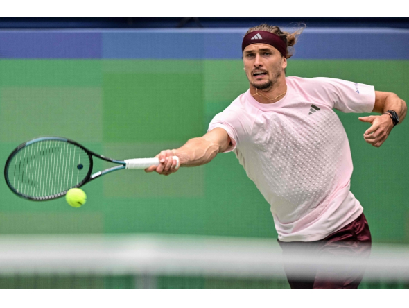 Germany's Alexander Zverev hits a return to China's Wu Yibing during their men's singles match at the Shanghai Masters tennis tournament in Shanghai on October 9, 2026. (Photo by Hector RETAMAL / AFP)